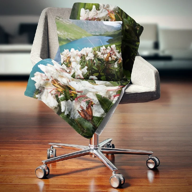 King - size blankets to cover large beds comfortablyKing - size blankets to cover large beds comfortablyDesignart 'Mountains Lake with White Flowers' Flower Throw Blanket