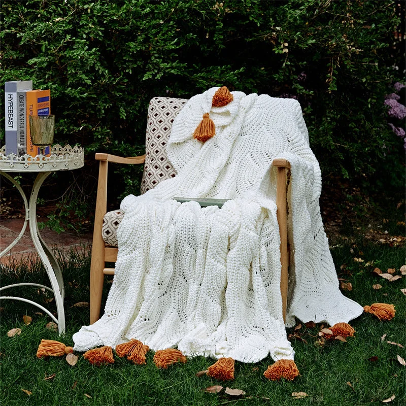 Recycled polyester blankets for an eco - conscious optionRecycled polyester blankets for an eco - conscious optionCozy Knit Pom Pom Blanket / White + Orange