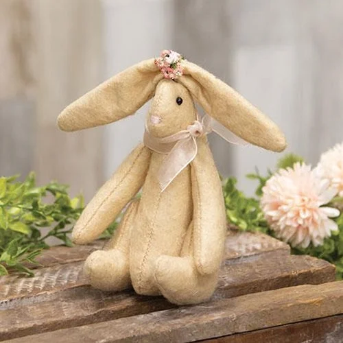Bed skirts with a scalloped hem for a charming detailSpring Floral Primitive Bunny Ornament