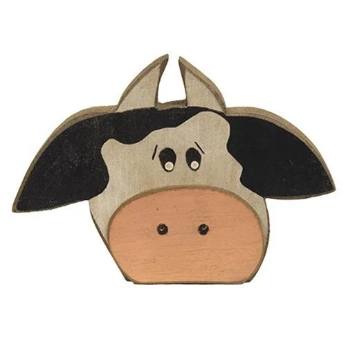 Bed skirts with a damask pattern for an elegant lookDistressed Wooden Cow Sitter