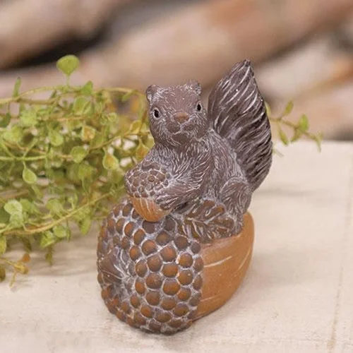 Linen bed skirts for a natural and rustic feelResin Squirrel on Acorn Figurine