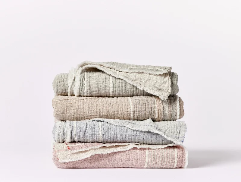 Velvet Pillows for a Touch of EleganceTopanga Organic Matelasse Striped Throw