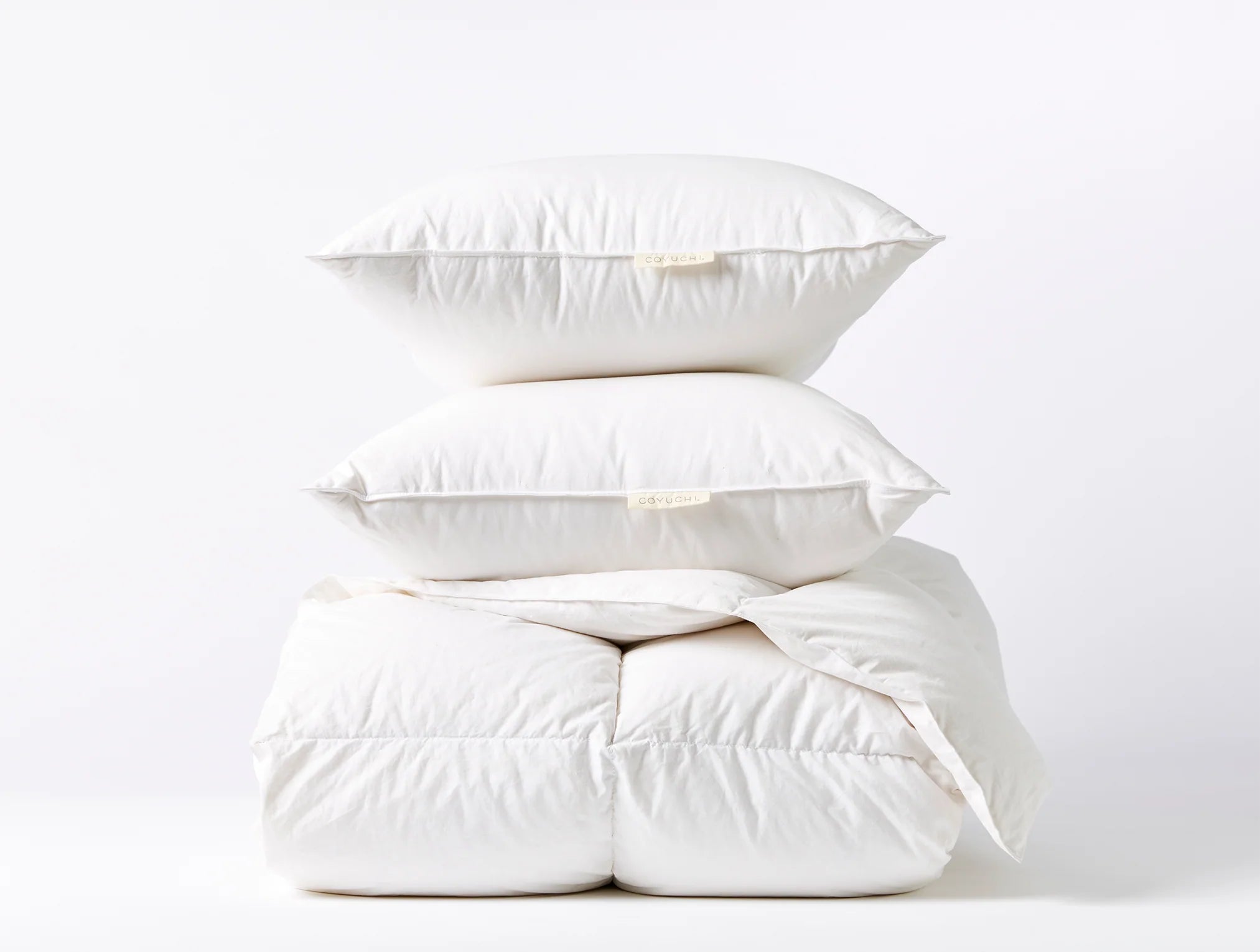Plush Pillows for a Cozy BedThree Season Down Essentials Bundle