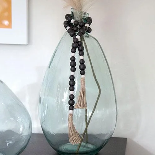 Bed skirts with a vintage - inspired patternBlack & White Bead Garland