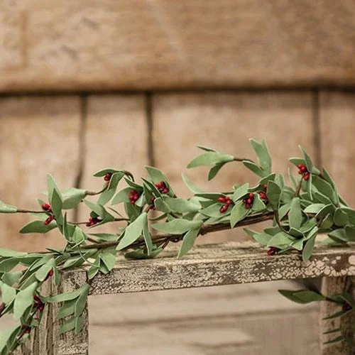 Bed skirts with a jacquard weave for a textured lookRed Pip & Foamy Herb Garland