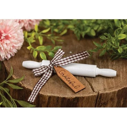 Bed skirts with a geometric cut - out designGrateful Wooden Rolling Pin
